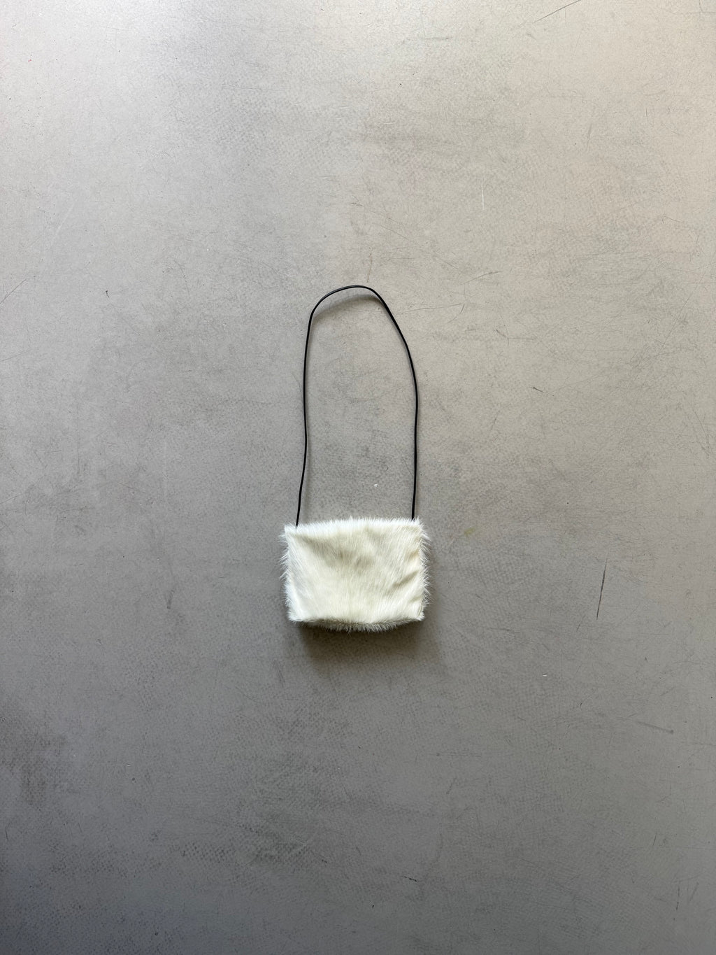 white goat fur crossbody bag