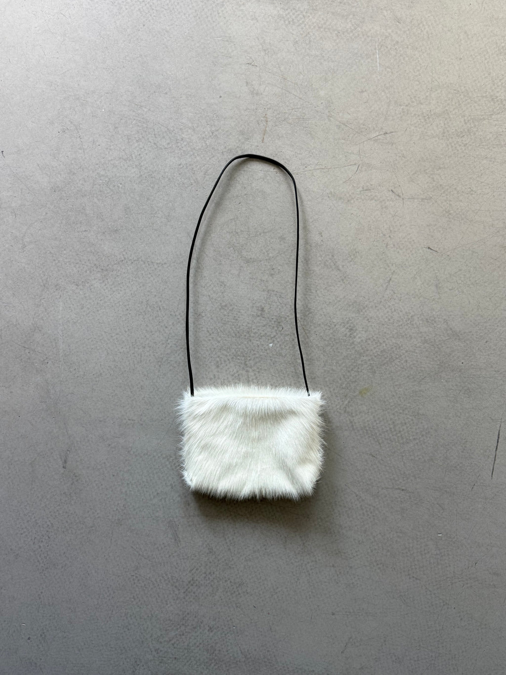 white goat fur crossbody bag