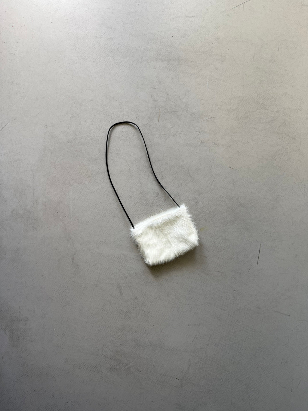 white goat fur crossbody bag