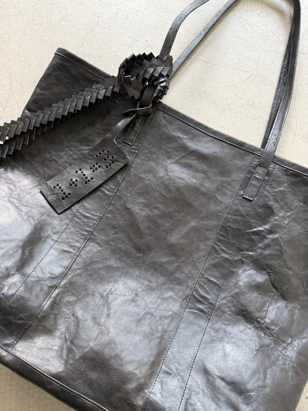 black leather tote bag